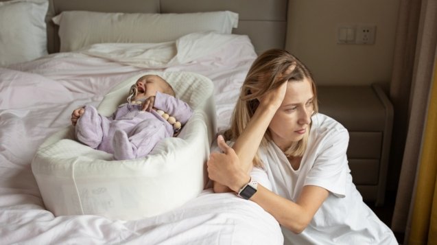 tired-mother-suffering-from-experiencing-postnatal-2024-11-07-13-12-35-utc